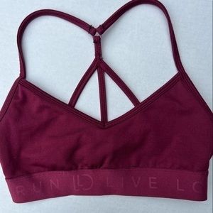 Women’s Live Love Dream sports bra. Maroon. Size small.